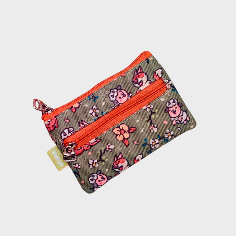 monedero colmillo y lanitas